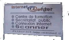 Pancarte Internet Center (source : Eric Bernard, 07/2001)